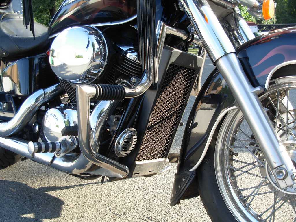 A crash bar with built-in highway pegs for Honda Shadow ACE 400-750 (1998-2003year)