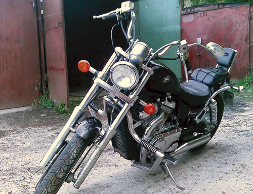 Захисні дуги з підставками для ніг на мотоцикл Suzuki Intruder VS400 (1994-2003р.)